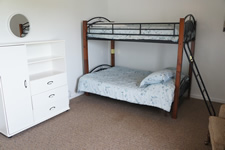 Bedroom with futon, queen and twin
